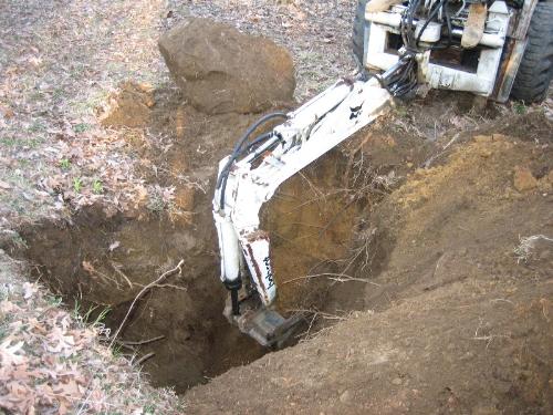 Davis Backhoe Hole.JPG