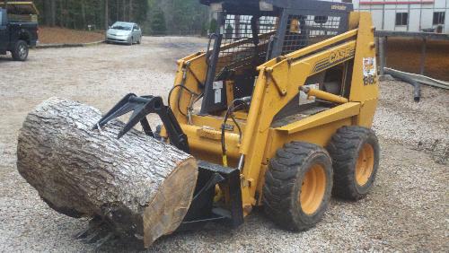 Gehl Case 1845C with grapple.jpg