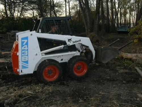 My 743B bobcat 743b side view logging.jpg