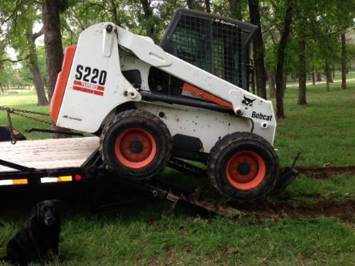 S 220 Bobcat stuck on ramp 1.JPG